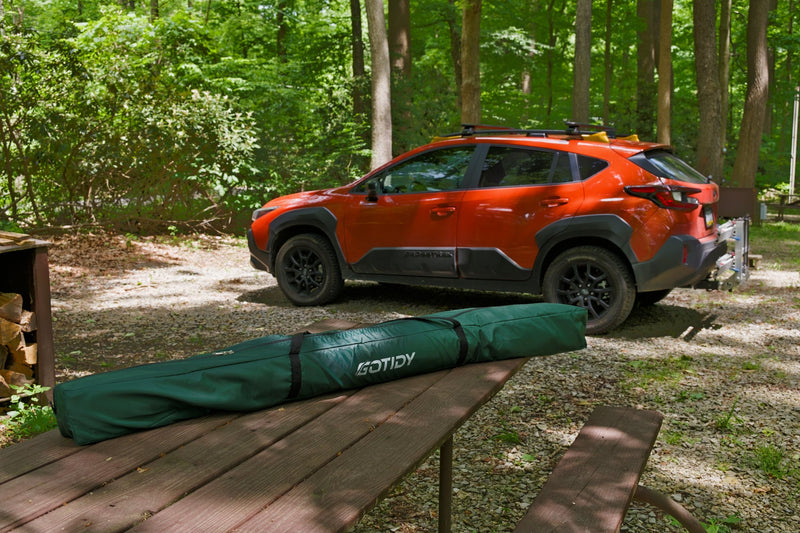 Load image into Gallery viewer, Tent bag on picnic table next to SUV