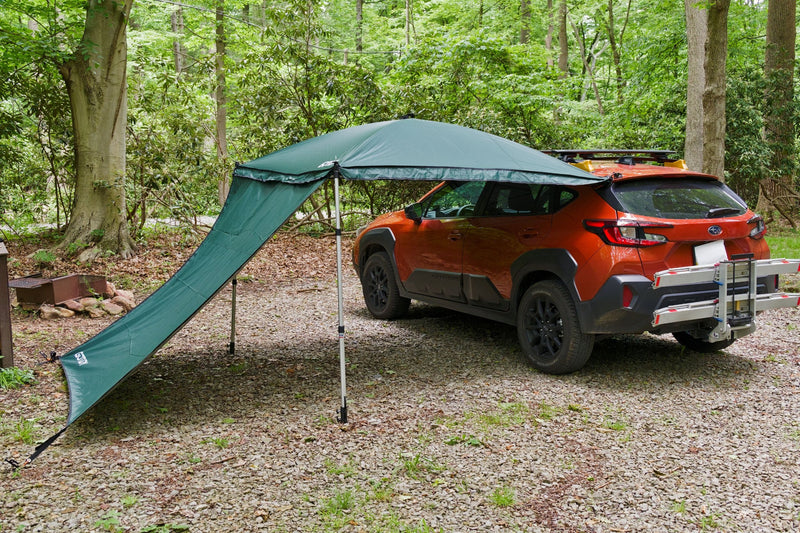 Load image into Gallery viewer, SUV parked in forest with awning tent