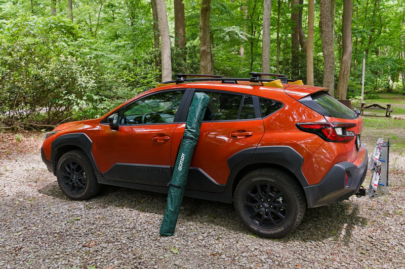 Load image into Gallery viewer, Car with awning tent in green storage bag standing