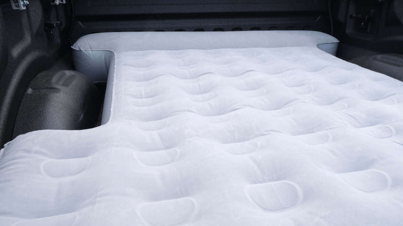 Load image into Gallery viewer, Close-up of the mattress surface and air channels.