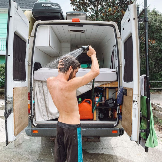 man showering outdoors