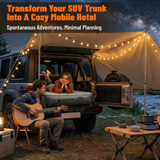 SUV trunk air mattress with cozy outdoor camping setup